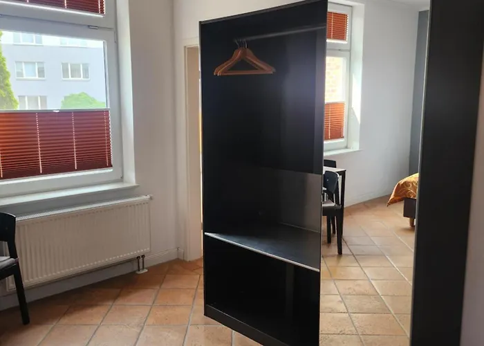 Unterwegs Ins Apartmenthaus Ehemalige Apartmenthaus Unterwegs 3* ロストック